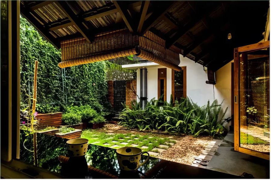 Thiết kế sân vườn đẹp đơn giản với phong cách nhiệt đới